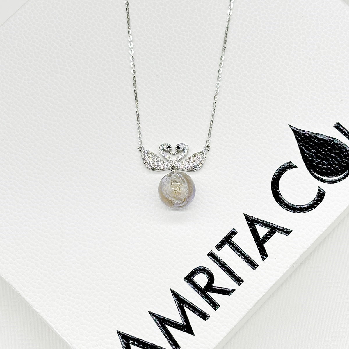 Collier Aroma Double Cygne en Argent Sterling - Or Violet | Énergie & Bien-être | Diffusion Nomade