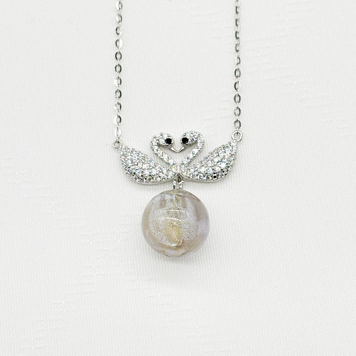 Collier Aroma Double Cygne en Argent Sterling - Or Violet | Énergie & Bien-être | Diffusion Nomade